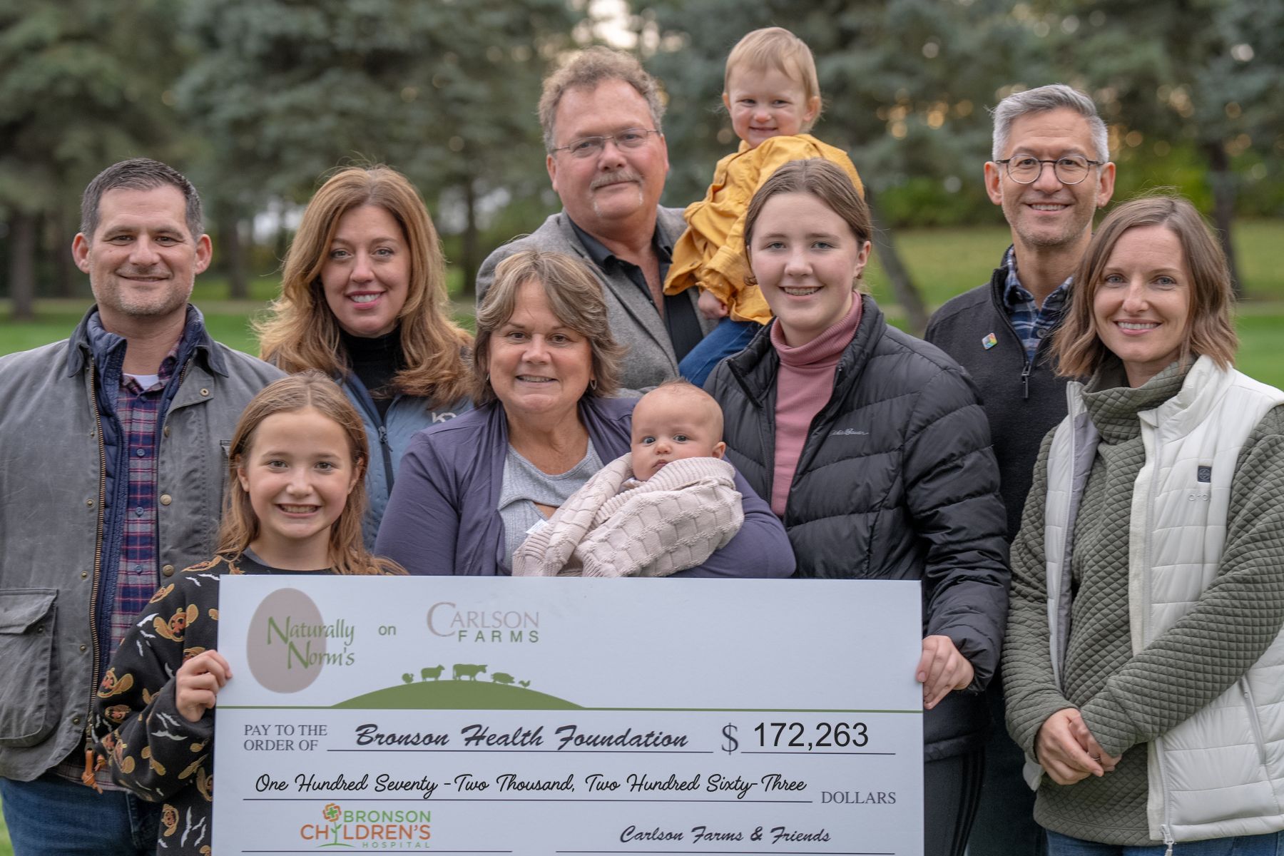 Carlson and Family big check.jpg